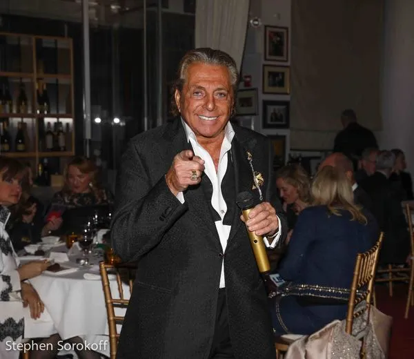Gianni Russo sharing his story with a microphone